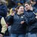 Members of the Michigan marching band smiles while in the stands during spring practice at Michigan Stadium on Saturday, April 13, 2013. Melanie Maxwell I AnnArbor.com